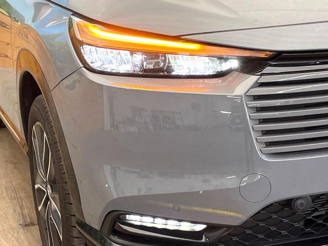 ヴェゼル ｅ：ＨＥＶ　Ｚ　ＳＤナビ　バックカメラ　ホンダセンシング　ステアリングヒーター　シートヒーター　コーナーセンサー　ブラインドビュースポットモニター　禁煙車　ＥＴＣ　ドラレコ　電動リアゲート　ハーフレザーシート（12枚目）