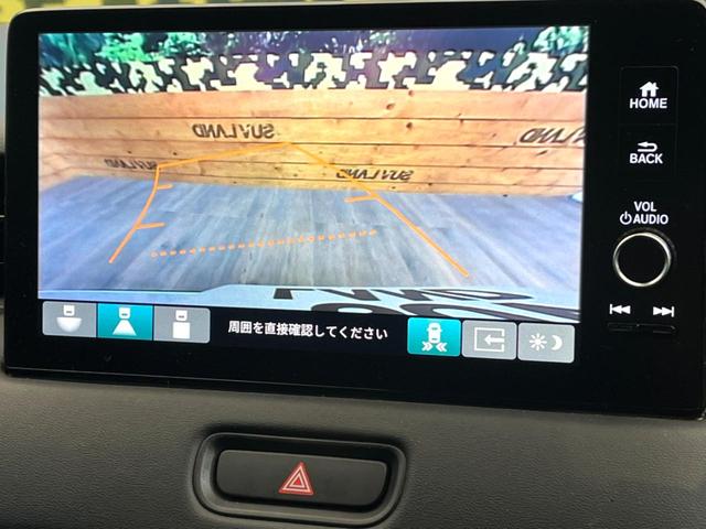 ヴェゼル ｅ：ＨＥＶ　Ｚ　禁煙車　純正９インチナビ　バックカメラ　ホンダセンシング　シートヒーター　ブラインドスポットモニター　レーダークルーズ　電動リアゲート　コーナーセンサー　パドルシフト　ＬＥＤヘッド　ＥＴＣ（4枚目）