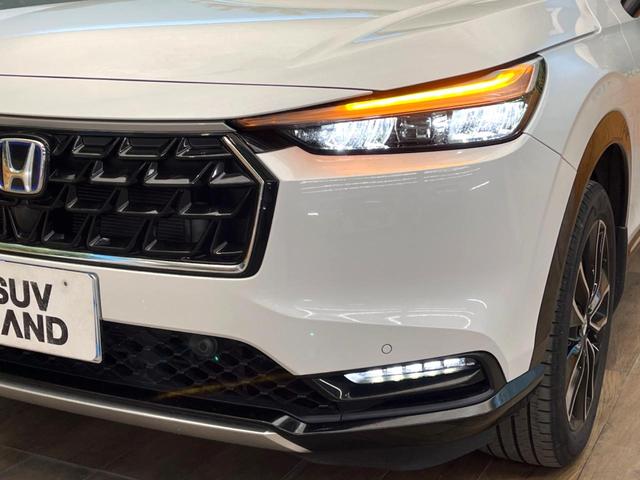 ヴェゼル ｅ：ＨＥＶ　Ｚ　禁煙車　純正９インチナビ　バックカメラ　ホンダセンシング　シートヒーター　ブラインドスポットモニター　レーダークルーズ　電動リアゲート　コーナーセンサー　パドルシフト　ＬＥＤヘッド　ＥＴＣ（12枚目）