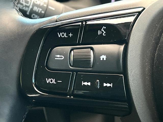 ヴェゼル ｅ：ＨＥＶ　Ｚ　禁煙車　純正９インチナビ　バックカメラ　ホンダセンシング　シートヒーター　ブラインドスポットモニター　レーダークルーズ　電動リアゲート　コーナーセンサー　パドルシフト　ＬＥＤヘッド　ＥＴＣ（49枚目）