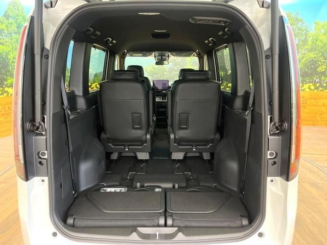 ステップワゴン スパーダ　登録済未使用車　純正１１型ナビ　バックカメラ　オットマン　ホンダセンシング　両側電動スライドドア　アダプティブクルーズ　パワーバックドア　パドルシフト　ＬＥＤヘッドライト　電動パーキングブレーキ（11枚目）