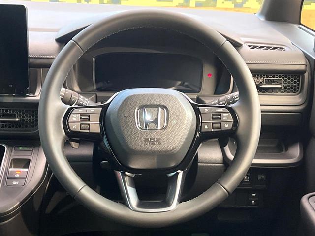 ステップワゴン スパーダ　登録済未使用車　純正１１型ナビ　バックカメラ　オットマン　ホンダセンシング　両側電動スライドドア　アダプティブクルーズ　パワーバックドア　パドルシフト　ＬＥＤヘッドライト　電動パーキングブレーキ（12枚目）