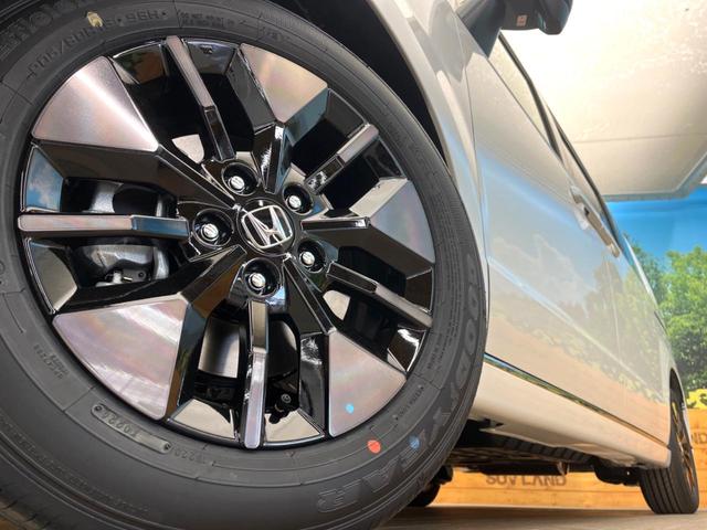 ステップワゴン スパーダ　登録済未使用車　純正１１型ナビ　バックカメラ　オットマン　ホンダセンシング　両側電動スライドドア　アダプティブクルーズ　パワーバックドア　パドルシフト　ＬＥＤヘッドライト　電動パーキングブレーキ（14枚目）