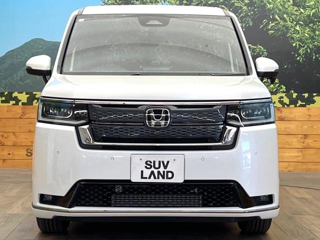 ステップワゴン スパーダ　登録済未使用車　純正１１型ナビ　バックカメラ　オットマン　ホンダセンシング　両側電動スライドドア　アダプティブクルーズ　パワーバックドア　パドルシフト　ＬＥＤヘッドライト　電動パーキングブレーキ（15枚目）