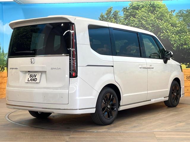ステップワゴン スパーダ　登録済未使用車　純正１１型ナビ　バックカメラ　オットマン　ホンダセンシング　両側電動スライドドア　アダプティブクルーズ　パワーバックドア　パドルシフト　ＬＥＤヘッドライト　電動パーキングブレーキ（17枚目）