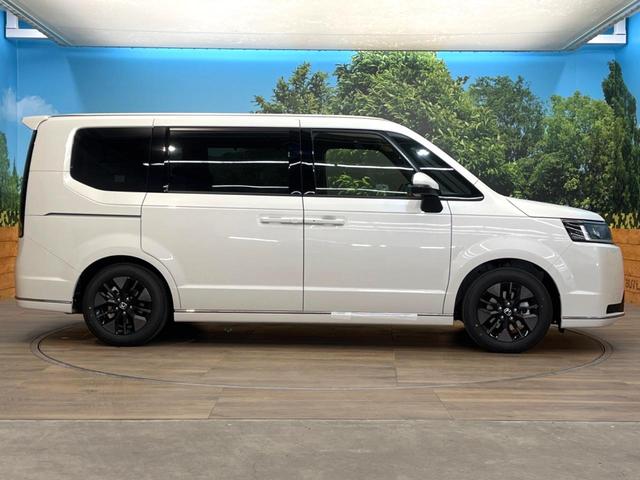 ステップワゴン スパーダ　登録済未使用車　純正１１型ナビ　バックカメラ　オットマン　ホンダセンシング　両側電動スライドドア　アダプティブクルーズ　パワーバックドア　パドルシフト　ＬＥＤヘッドライト　電動パーキングブレーキ（29枚目）