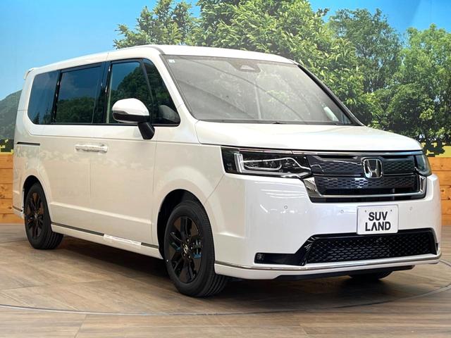 ステップワゴン スパーダ　登録済未使用車　純正１１型ナビ　バックカメラ　オットマン　ホンダセンシング　両側電動スライドドア　アダプティブクルーズ　パワーバックドア　パドルシフト　ＬＥＤヘッドライト　電動パーキングブレーキ（30枚目）