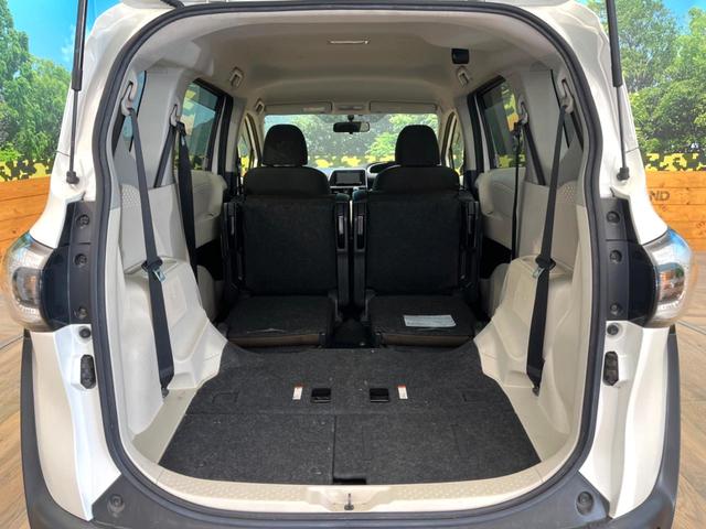 シエンタ ハイブリッドＧ　禁煙車　両側電動ドア　ＳＤナビ　バックカメラ　１００Ｖ電源　７人乗り　スマートキー　ＨＩＤヘッド　ＥＴＣ　オートエアコン　ＣＤ　ＤＶＤ再生　エコモード　ＥＶモード　１５インチスチールホイール（11枚目）