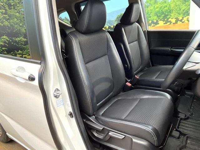 フリード＋ Ｇ・ホンダセンシング　純正９インチナビ　バックカメラ　両側電動スライドドア　ホンダセンシング　アダプティブクルーズ　ＥＴＣ　スマートキー　ＬＥＤヘッドライト　クリアランスソナー　車線逸脱防止　５人乗り　革巻きステアリング（8枚目）