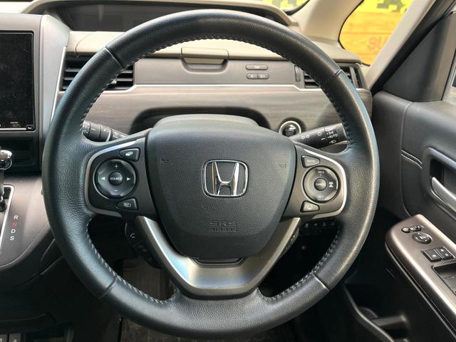 フリード＋ Ｇ・ホンダセンシング　純正９インチナビ　バックカメラ　両側電動スライドドア　ホンダセンシング　アダプティブクルーズ　ＥＴＣ　スマートキー　ＬＥＤヘッドライト　クリアランスソナー　車線逸脱防止　５人乗り　革巻きステアリング（11枚目）