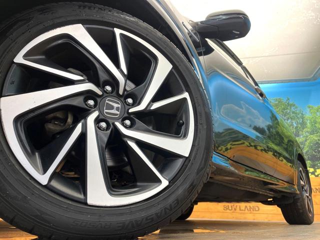 ヴェゼル ハイブリッドＲＳ・ホンダセンシング　禁煙車　純正ナビ　バックカメラ　ホンダセンシング　パドルシフト　アダプティブクルーズ　純正１８インチアルミ　ＬＥＤヘッドライト　ハーフレザーシート　ＥＴＣ　シートヒーター　車線逸脱防止（13枚目）