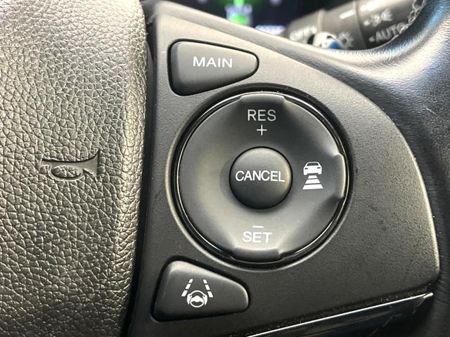 ヴェゼル ハイブリッドＲＳ・ホンダセンシング　禁煙車　純正ナビ　バックカメラ　ホンダセンシング　パドルシフト　アダプティブクルーズ　純正１８インチアルミ　ＬＥＤヘッドライト　ハーフレザーシート　ＥＴＣ　シートヒーター　車線逸脱防止（51枚目）