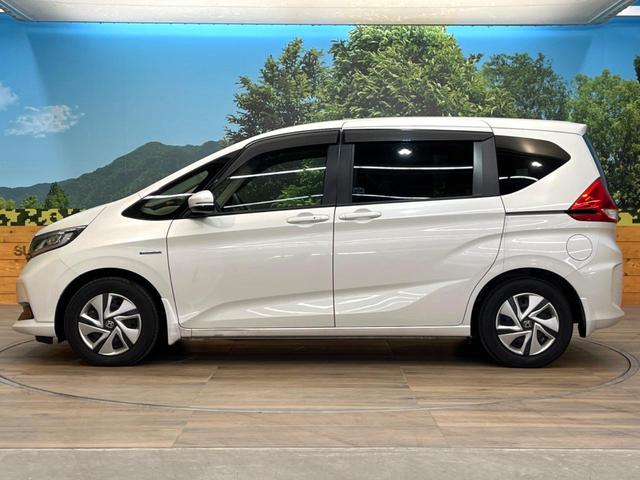 フリードハイブリッド ハイブリッド・Ｇホンダセンシング　禁煙車　両側電動ドア　純正ＳＤナビ　バックカメラ　衝突被害軽減システム　レーダークルーズ　ドラレコ　コーナーセンサー　スマートキー　ＬＥＤヘッド　ビルトインＥＴＣ　純正１５インチアルミ　車線逸脱警報（25枚目）