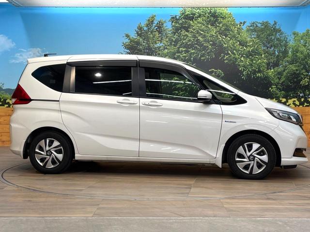 フリードハイブリッド ハイブリッド・Ｇホンダセンシング　禁煙車　両側電動ドア　純正ＳＤナビ　バックカメラ　衝突被害軽減システム　レーダークルーズ　ドラレコ　コーナーセンサー　スマートキー　ＬＥＤヘッド　ビルトインＥＴＣ　純正１５インチアルミ　車線逸脱警報（26枚目）