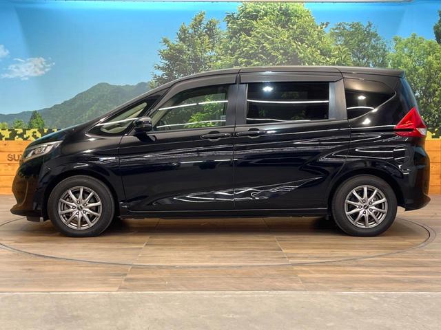 フリードハイブリッド ハイブリッド・Ｇホンダセンシング　両側電動ドア　ＳＤナビ　バックカメラ　衝突被害軽減システム　レーダークルーズ　禁煙車　コーナーセンサー　スマートキー　ＬＥＤヘッド　ビルトインＥＴＣ　車線逸脱警報　オートライト　オートエアコン（23枚目）