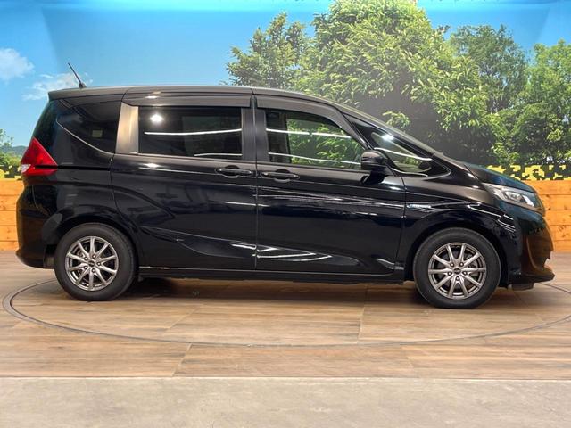 フリードハイブリッド ハイブリッド・Ｇホンダセンシング　両側電動ドア　ＳＤナビ　バックカメラ　衝突被害軽減システム　レーダークルーズ　禁煙車　コーナーセンサー　スマートキー　ＬＥＤヘッド　ビルトインＥＴＣ　車線逸脱警報　オートライト　オートエアコン（24枚目）