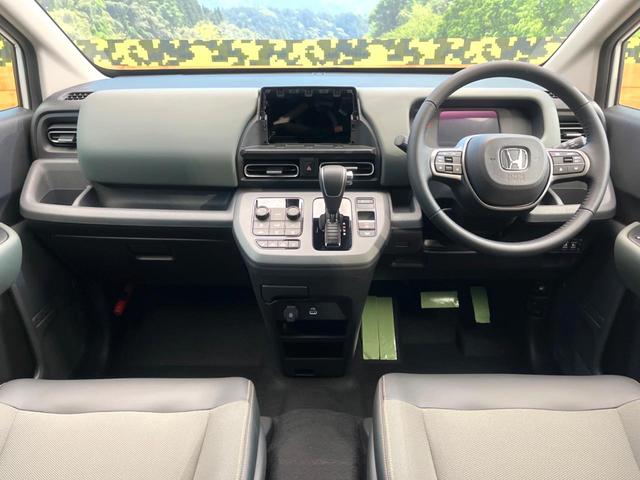 フリード e:HEVクロスター 登録済未使用車 両側電動ドア 衝突被害軽減システム レーダークルーズ ハーフレザーシート コーナーセンサー スマートキー LEDヘッド 純正15インチアルミ 車線逸脱警報 オートライト(2枚目)