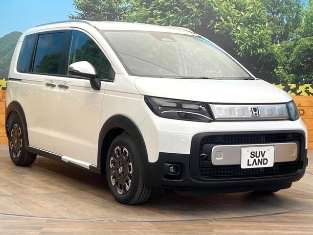 フリード e:HEVクロスター 登録済未使用車 両側電動ドア 衝突被害軽減システム レーダークルーズ ハーフレザーシート コーナーセンサー スマートキー LEDヘッド 純正15インチアルミ 車線逸脱警報 オートライト(25枚目)