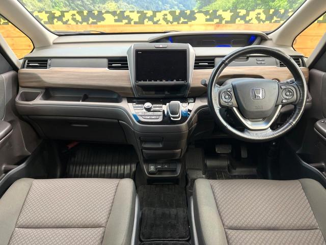 フリードハイブリッド ハイブリッド・Ｇホンダセンシング　禁煙車　両側電動ドア　バックカメラ　衝突被害軽減システム　レーダークルーズ　ドラレコ　スマートキー　ＬＥＤヘッド　ビルトインＥＴＣ　純正１５インチアルミ　車線逸脱警報　オートライト　オートエアコン（2枚目）