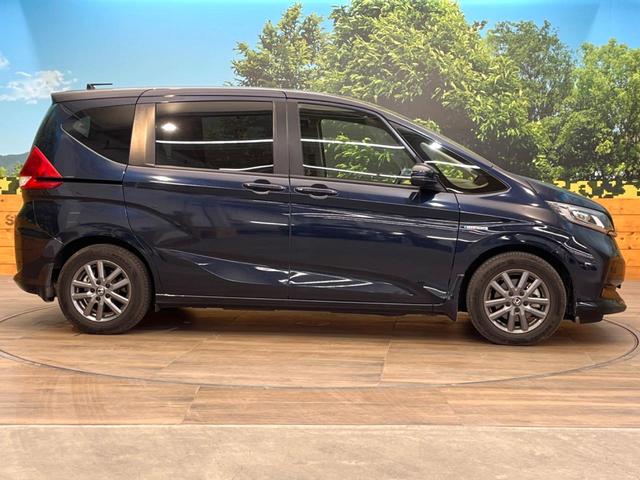フリードハイブリッド ハイブリッド・Ｇホンダセンシング　禁煙車　両側電動ドア　バックカメラ　衝突被害軽減システム　レーダークルーズ　ドラレコ　スマートキー　ＬＥＤヘッド　ビルトインＥＴＣ　純正１５インチアルミ　車線逸脱警報　オートライト　オートエアコン（30枚目）