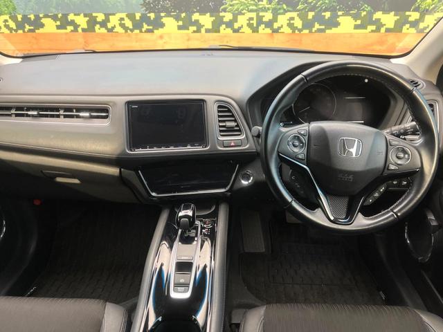 ヴェゼル ハイブリッドZ・ホンダセンシング 禁煙車 8インチ純正SDナビ バックカメラ ホンダセンシング ハーフレザーシート ドラレコ スマートキー LEDヘッド ルーフレール ビルトインETC 純正17インチアルミ オートハイビーム(2枚目)