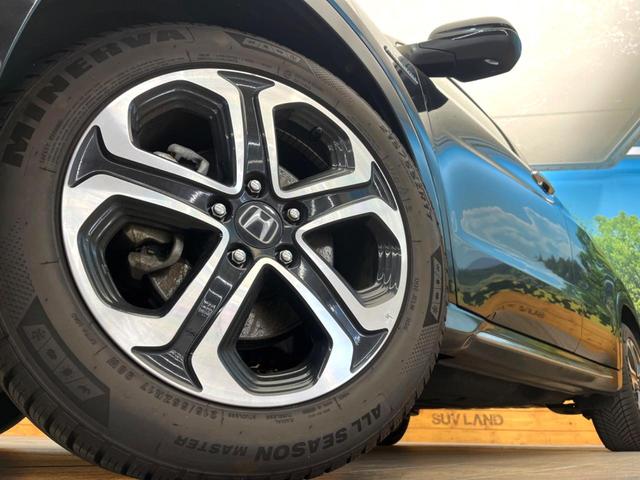 ヴェゼル ハイブリッドZ・ホンダセンシング 禁煙車 8インチ純正SDナビ バックカメラ ホンダセンシング ハーフレザーシート ドラレコ スマートキー LEDヘッド ルーフレール ビルトインETC 純正17インチアルミ オートハイビーム(13枚目)