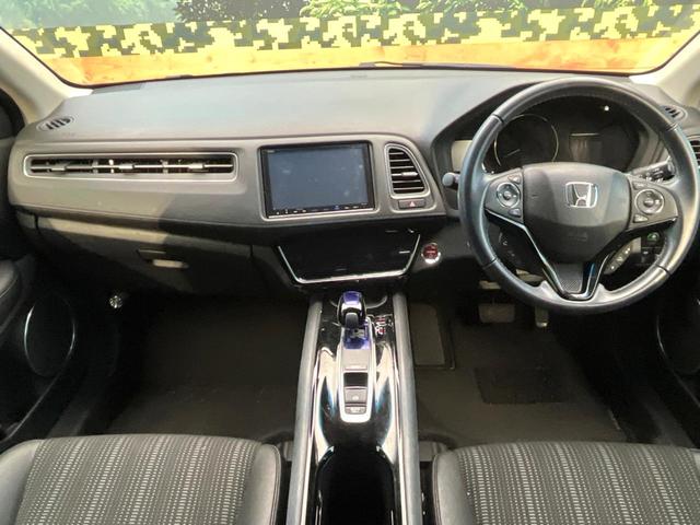 ヴェゼル ハイブリッドＺ・ホンダセンシング　禁煙車　純正ＳＤナビ　バックカメラ　ホンダセンシング　アダプティブクルーズ　ハーフレザーシート　ドラレコ　スマートキー　ＬＥＤヘッド　ＥＴＣ　純正１７インチアルミ　オートハイビーム（2枚目）