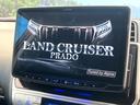 ランドクルーザープラド TX Lパッケージ 禁煙車 11インチBIGX ディーゼルターボ バックカメラ ムーンルーフ モデリスタフルエアロ V-VISIONマフラー 黒革シート LEDヘッドライト ルーフレール ETC セーフティセンス 中古車画像_3