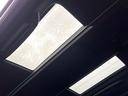 ヴェルファイアハイブリッド Z プレミア 禁煙車 ガラスルーフ 両側電動ドア 後席モニター 全周囲カメラ 100V電源 セーフティセンス 電動リアゲート レザーシート 前席シートエアコン 前後席パワーシート ドラレコ コーナーセンサー 中古車画像_3
