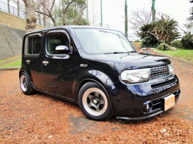 キューブ １５Ｘ　インディゴ＋プラズマ　ナビ　フルセグ　社外シートカバー　車高調　社外アルミ　社外ウインカーミラー（6枚目）