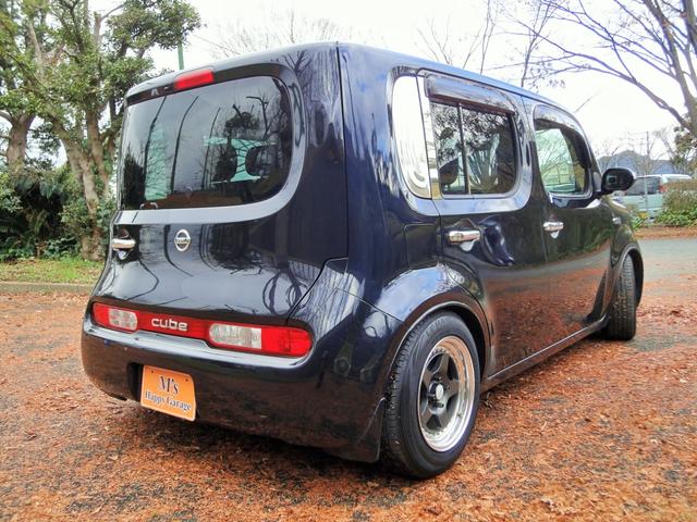 キューブ １５Ｘ　インディゴ＋プラズマ　ナビ　フルセグ　社外シートカバー　車高調　社外アルミ　社外ウインカーミラー（8枚目）
