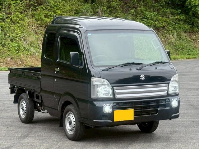 スーパーキャリイ Ｌ　軽トラック　５速マニュアル車　衝突被害軽減システム　エアコン　パワーウィンドウ　助手席エアバッグ　ＣＤ　最大積載量３５０ｋｇ　ＭＯＭＯステアリング（12枚目）