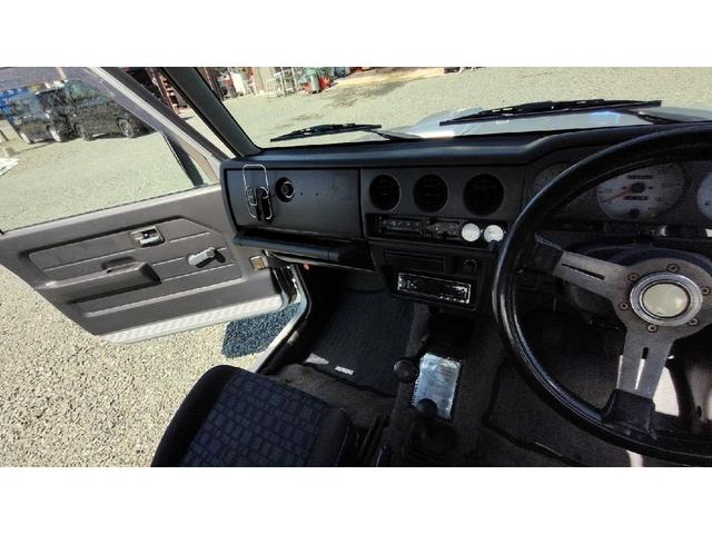 ジムニー ワイルドウインド　パートタイム４ＷＤ　５ＭＴ　ラジオ　エアコン　フォグランプ　パワーステアリング　背面スペアタイヤ　ドアザイザー　ルーフキャリア　取扱説明書（2枚目）