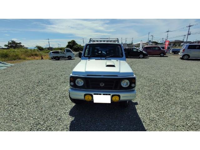 ジムニー ワイルドウインド　パートタイム４ＷＤ　５ＭＴ　ラジオ　エアコン　フォグランプ　パワーステアリング　背面スペアタイヤ　ドアザイザー　ルーフキャリア　取扱説明書（12枚目）