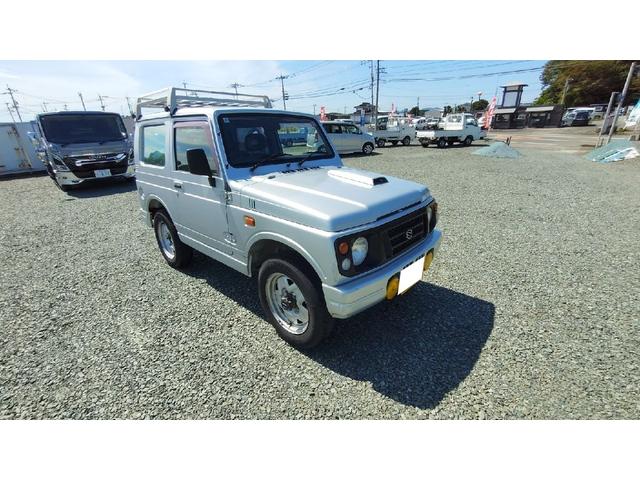 ジムニー ワイルドウインド　パートタイム４ＷＤ　５ＭＴ　ラジオ　エアコン　フォグランプ　パワーステアリング　背面スペアタイヤ　ドアザイザー　ルーフキャリア　取扱説明書（13枚目）