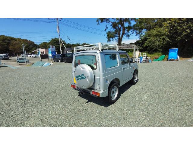 ジムニー ワイルドウインド　パートタイム４ＷＤ　５ＭＴ　ラジオ　エアコン　フォグランプ　パワーステアリング　背面スペアタイヤ　ドアザイザー　ルーフキャリア　取扱説明書（15枚目）