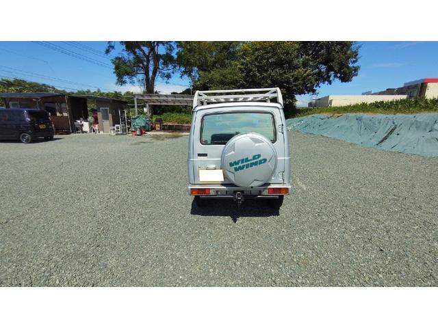 ジムニー ワイルドウインド　パートタイム４ＷＤ　５ＭＴ　ラジオ　エアコン　フォグランプ　パワーステアリング　背面スペアタイヤ　ドアザイザー　ルーフキャリア　取扱説明書（16枚目）