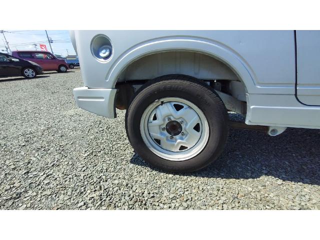 ジムニー ワイルドウインド　パートタイム４ＷＤ　５ＭＴ　ラジオ　エアコン　フォグランプ　パワーステアリング　背面スペアタイヤ　ドアザイザー　ルーフキャリア　取扱説明書（35枚目）