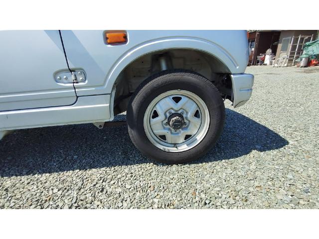 ジムニー ワイルドウインド　パートタイム４ＷＤ　５ＭＴ　ラジオ　エアコン　フォグランプ　パワーステアリング　背面スペアタイヤ　ドアザイザー　ルーフキャリア　取扱説明書（40枚目）