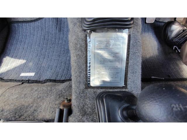 ジムニー ワイルドウインド　パートタイム４ＷＤ　５ＭＴ　ラジオ　エアコン　フォグランプ　パワーステアリング　背面スペアタイヤ　ドアザイザー　ルーフキャリア　取扱説明書（41枚目）