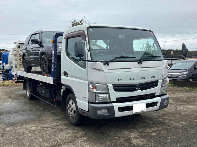 キャンター 　トラック　ＭＴ　後輪ダブル　ＥＴＣ　ナビ　ＴＶ　電動格納ミラー　エアコン　パワーウィンドウ　運転席エアバッグ　ＣＤ　Ｂｌｕｅｔｏｏｔｈ（3枚目）