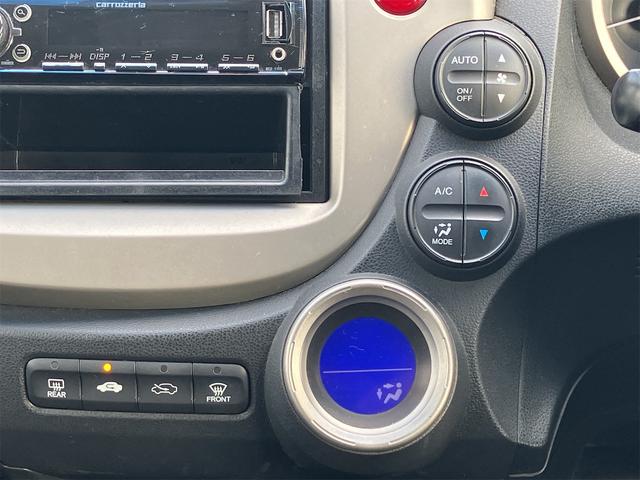 フィットハイブリッド スマートセレクション ハイブリッド オートクルーズコントロール オートライト HID スマートキー 電動格納ミラー CVT レンタカーアップ 盗難防止システム 衝突安全ボディ CD USB ABS エアコン(6枚目)