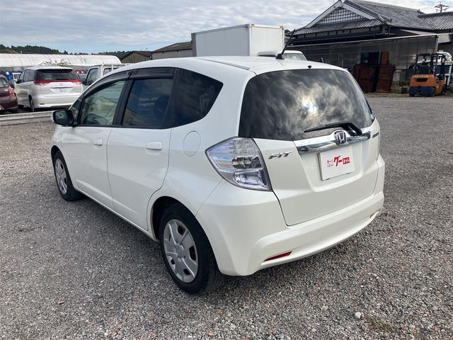 フィットハイブリッド スマートセレクション ハイブリッド オートクルーズコントロール オートライト HID スマートキー 電動格納ミラー CVT レンタカーアップ 盗難防止システム 衝突安全ボディ CD USB ABS エアコン(16枚目)