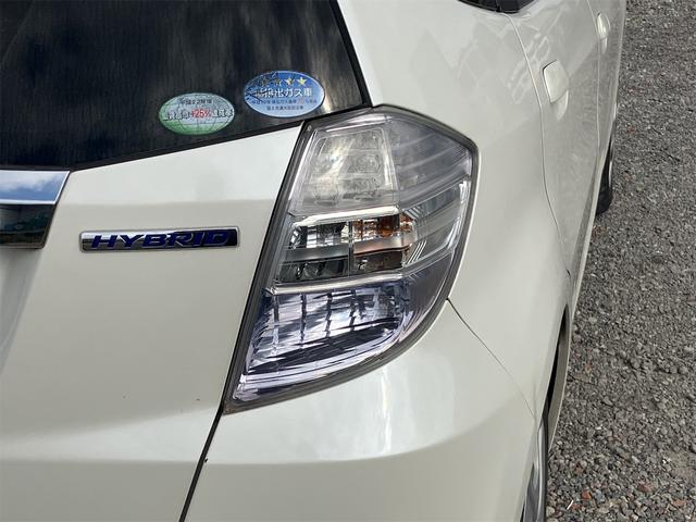 フィットハイブリッド スマートセレクション ハイブリッド オートクルーズコントロール オートライト HID スマートキー 電動格納ミラー CVT レンタカーアップ 盗難防止システム 衝突安全ボディ CD USB ABS エアコン(18枚目)