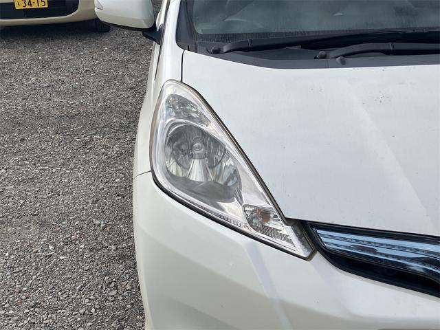 フィットハイブリッド スマートセレクション ハイブリッド オートクルーズコントロール オートライト HID スマートキー 電動格納ミラー CVT レンタカーアップ 盗難防止システム 衝突安全ボディ CD USB ABS エアコン(21枚目)