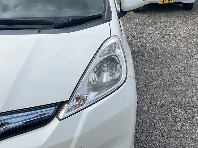 フィットハイブリッド スマートセレクション ハイブリッド オートクルーズコントロール オートライト HID スマートキー 電動格納ミラー CVT レンタカーアップ 盗難防止システム 衝突安全ボディ CD USB ABS エアコン(22枚目)