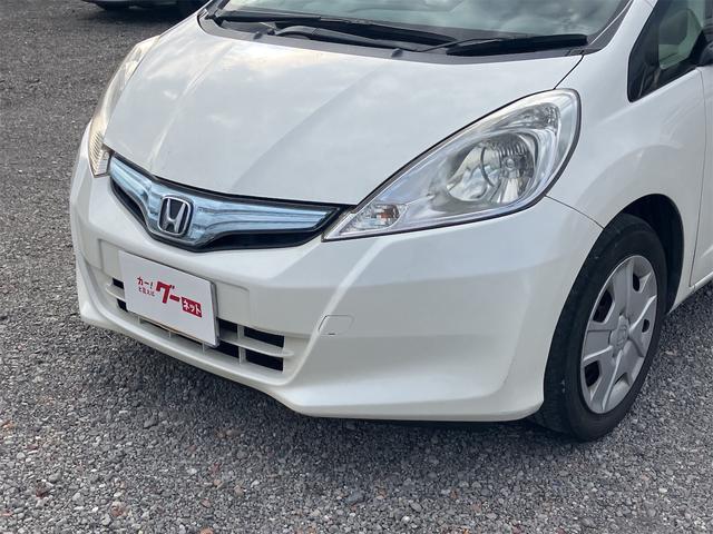 フィットハイブリッド スマートセレクション ハイブリッド オートクルーズコントロール オートライト HID スマートキー 電動格納ミラー CVT レンタカーアップ 盗難防止システム 衝突安全ボディ CD USB ABS エアコン(23枚目)