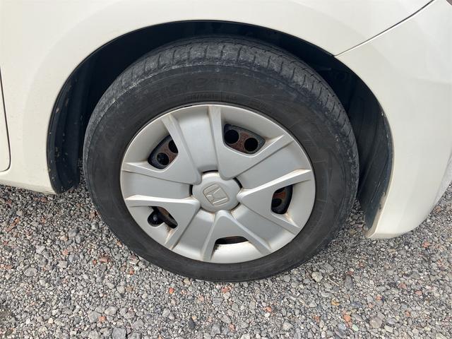 フィットハイブリッド スマートセレクション ハイブリッド オートクルーズコントロール オートライト HID スマートキー 電動格納ミラー CVT レンタカーアップ 盗難防止システム 衝突安全ボディ CD USB ABS エアコン(29枚目)