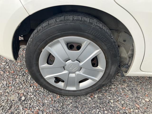 フィットハイブリッド スマートセレクション ハイブリッド オートクルーズコントロール オートライト HID スマートキー 電動格納ミラー CVT レンタカーアップ 盗難防止システム 衝突安全ボディ CD USB ABS エアコン(30枚目)