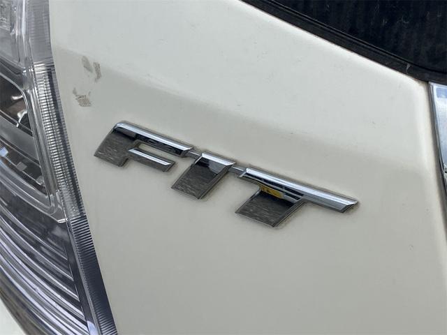 フィットハイブリッド スマートセレクション ハイブリッド オートクルーズコントロール オートライト HID スマートキー 電動格納ミラー CVT レンタカーアップ 盗難防止システム 衝突安全ボディ CD USB ABS エアコン(32枚目)